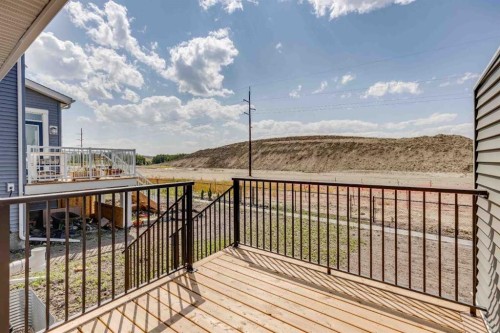 24 Southborough Common, Cochrane, AB - Outdoor With Deck Patio Veranda