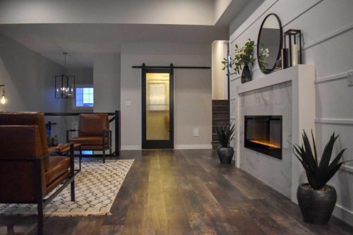 12 Vanson Close, Sylvan Lake, AB - Indoor With Fireplace
