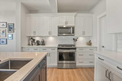 4185 Ryders Ridge Boulevard, Sylvan Lake, AB - Indoor Photo Showing Kitchen With Upgraded Kitchen