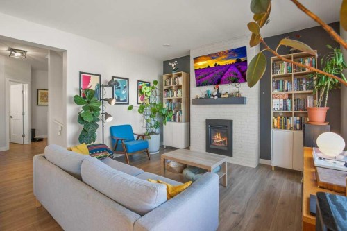 4185 Ryders Ridge Boulevard, Sylvan Lake, AB - Indoor Photo Showing Living Room With Fireplace