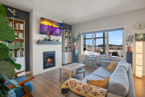 4185 Ryders Ridge Boulevard, Sylvan Lake, AB - Indoor Photo Showing Living Room With Fireplace