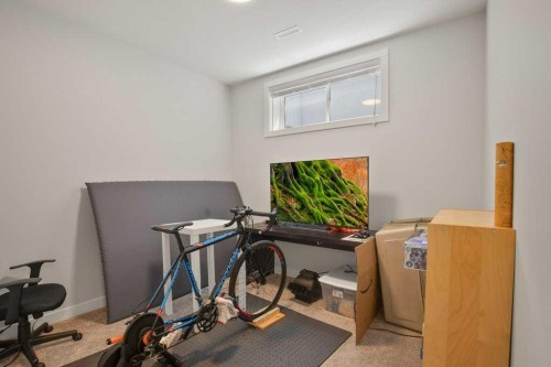4185 Ryders Ridge Boulevard, Sylvan Lake, AB - Indoor Photo Showing Gym Room