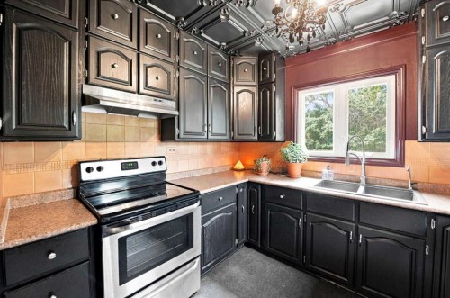 204 Birkett Street, Bittern Lake, AB - Indoor Photo Showing Kitchen With Double Sink