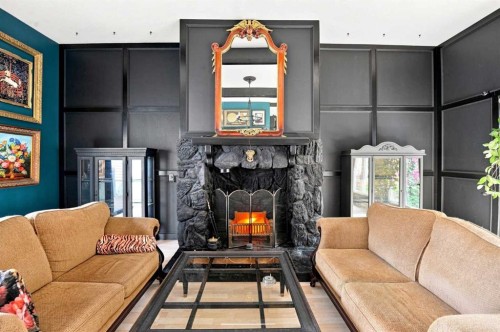 204 Birkett Street, Bittern Lake, AB - Indoor Photo Showing Living Room With Fireplace