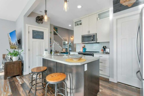 14 Mckay Boulevard, Blackfalds, AB - Indoor Photo Showing Kitchen With Double Sink With Upgraded Kitchen