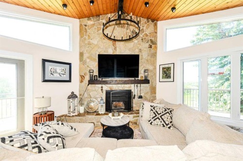 48012 195 Range, Rural Camrose County, AB - Indoor Photo Showing Living Room With Fireplace