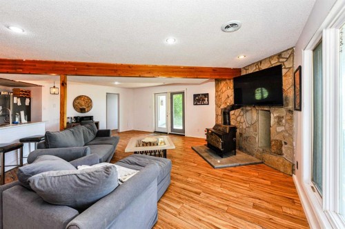 48012 195 Range, Rural Camrose County, AB - Indoor Photo Showing Living Room With Fireplace