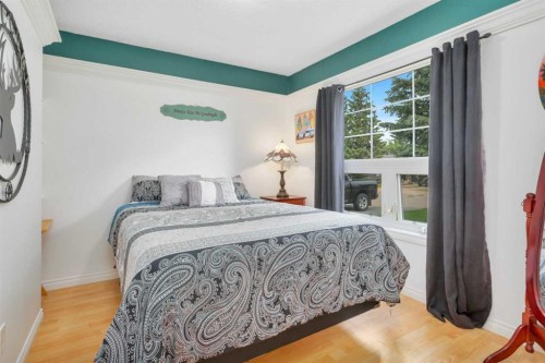 5108 49 Street, Clive, AB - Indoor Photo Showing Bedroom