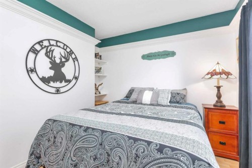 5108 49 Street, Clive, AB - Indoor Photo Showing Bedroom