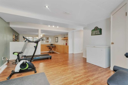5108 49 Street, Clive, AB - Indoor Photo Showing Gym Room