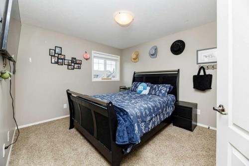 9 Henner'S Outlook, Lacombe, AB - Indoor Photo Showing Bedroom