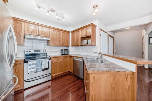 102-6220 Orr Drive, Red Deer, AB - Indoor Photo Showing Kitchen With Double Sink