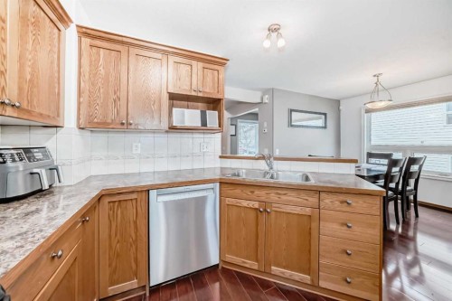 102-6220 Orr Drive, Red Deer, AB - Indoor Photo Showing Kitchen With Double Sink