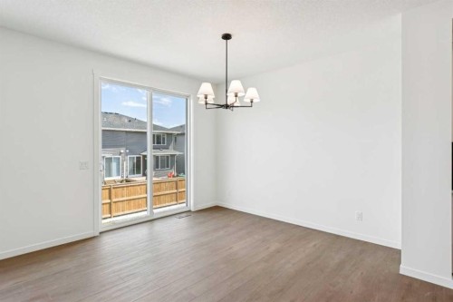 28 Southborough Bay, Cochrane, AB - Indoor Photo Showing Other Room