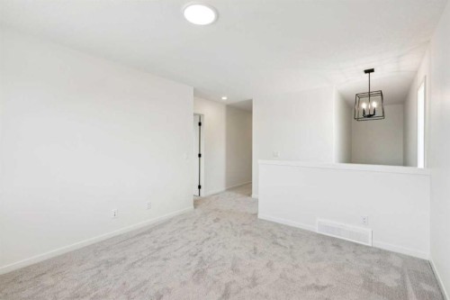 28 Southborough Bay, Cochrane, AB - Indoor Photo Showing Other Room