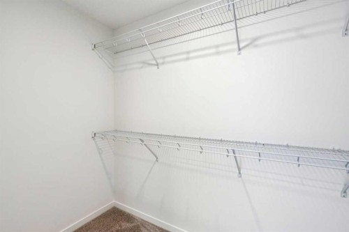 28 Southborough Bay, Cochrane, AB - Indoor With Storage