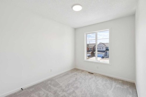 28 Southborough Bay, Cochrane, AB - Indoor Photo Showing Other Room