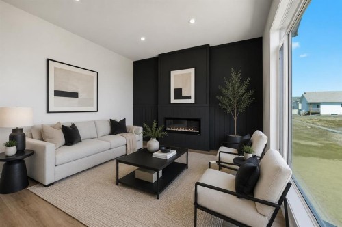 6600 58 Avenue, Innisfail, AB - Indoor Photo Showing Living Room With Fireplace