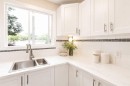 302 Terrace Park, Red Deer, AB  - Indoor Photo Showing Kitchen With Double Sink 
