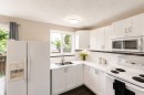 302 Terrace Park, Red Deer, AB  - Indoor Photo Showing Kitchen With Double Sink 