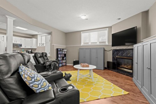 833 10 Avenue Ne, Three Hills, AB - Indoor Photo Showing Living Room With Fireplace