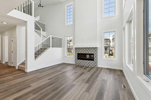 64 Creekstone Manor Sw, Calgary, AB - Indoor With Fireplace