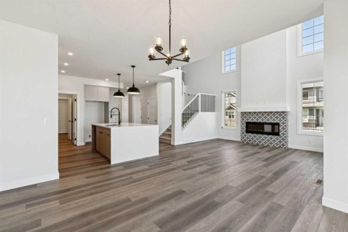 64 Creekstone Manor Sw, Calgary, AB - Indoor With Fireplace