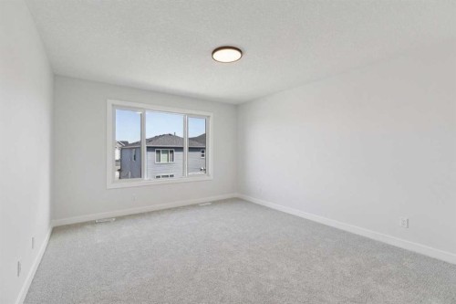 64 Creekstone Manor Sw, Calgary, AB - Indoor Photo Showing Other Room