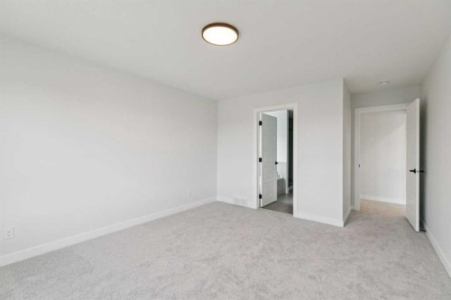 64 Creekstone Manor Sw, Calgary, AB - Indoor Photo Showing Other Room