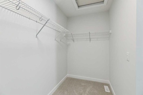 64 Creekstone Manor Sw, Calgary, AB - Indoor With Storage