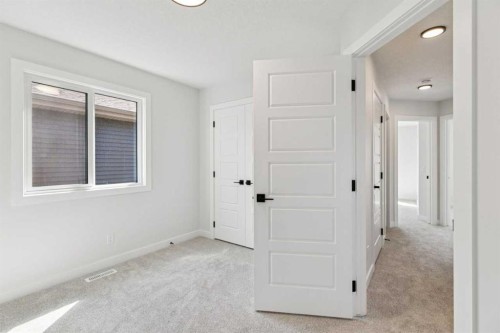 64 Creekstone Manor Sw, Calgary, AB - Indoor Photo Showing Other Room