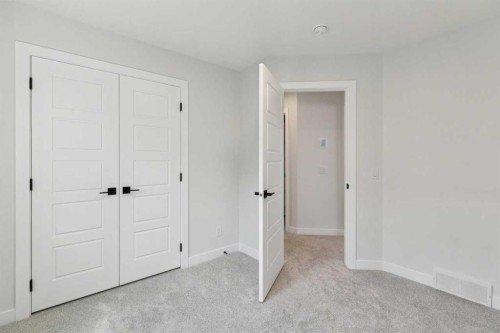 64 Creekstone Manor Sw, Calgary, AB - Indoor Photo Showing Other Room