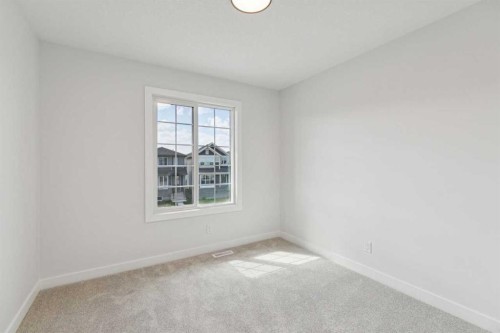 64 Creekstone Manor Sw, Calgary, AB - Indoor Photo Showing Other Room