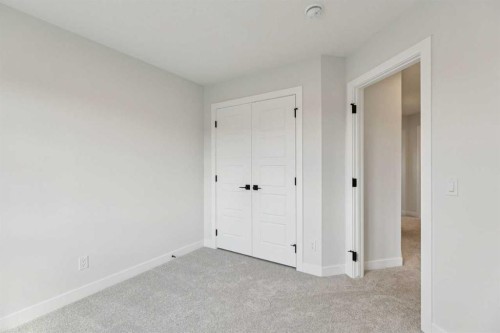 64 Creekstone Manor Sw, Calgary, AB - Indoor Photo Showing Other Room