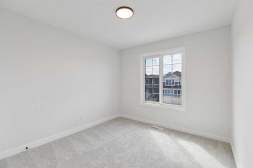 64 Creekstone Manor Sw, Calgary, AB - Indoor Photo Showing Other Room