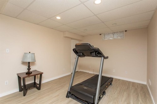8 Caswell Close, Red Deer, AB - Indoor Photo Showing Gym Room