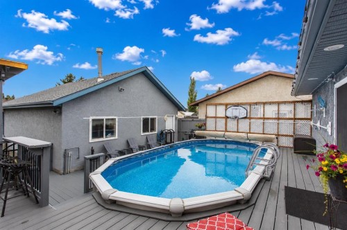 8 Caswell Close, Red Deer, AB - Outdoor With Above Ground Pool With Deck Patio Veranda With Exterior