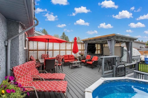 8 Caswell Close, Red Deer, AB - Outdoor With Above Ground Pool With Deck Patio Veranda With Exterior