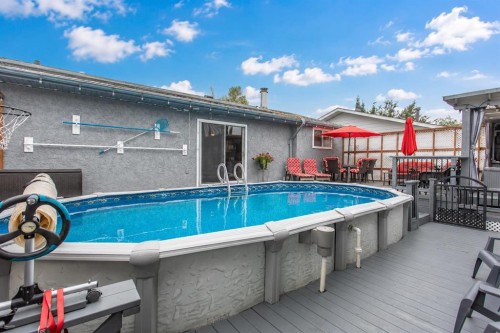 8 Caswell Close, Red Deer, AB - Outdoor With Above Ground Pool With Deck Patio Veranda With Exterior