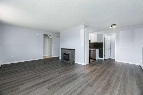 27-11 Stanton Street, Red Deer, AB - Indoor With Fireplace