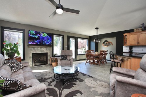 310B Edgewood Close, Camrose, AB - Indoor Photo Showing Living Room With Fireplace