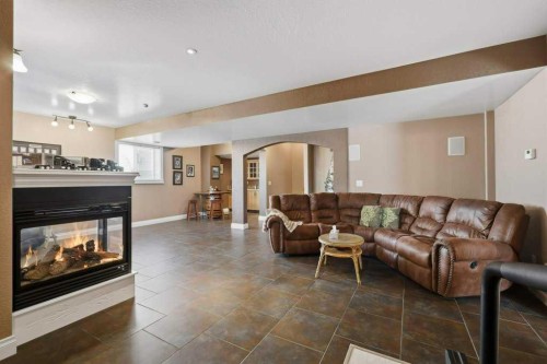 28 Oakdale Place, Red Deer, AB - Indoor Photo Showing Living Room With Fireplace