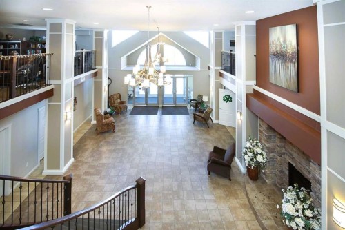 227-6 Michener Boulevard, Red Deer, AB - Indoor Photo Showing Other Room With Fireplace