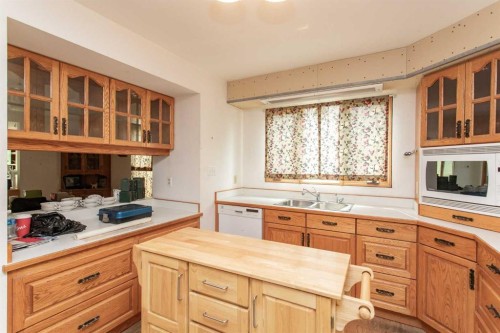37 Pamely Avenue, Red Deer, AB - Indoor Photo Showing Kitchen With Double Sink