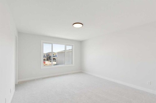 425 Lewiston Landing Ne, Calgary, AB - Indoor Photo Showing Other Room