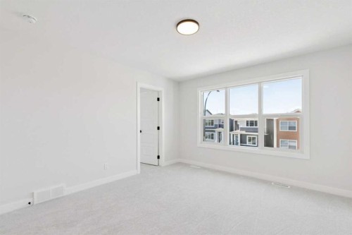 425 Lewiston Landing Ne, Calgary, AB - Indoor Photo Showing Other Room