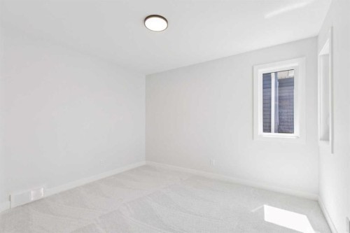 425 Lewiston Landing Ne, Calgary, AB - Indoor Photo Showing Other Room