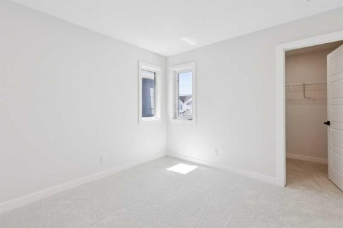 425 Lewiston Landing Ne, Calgary, AB - Indoor Photo Showing Other Room