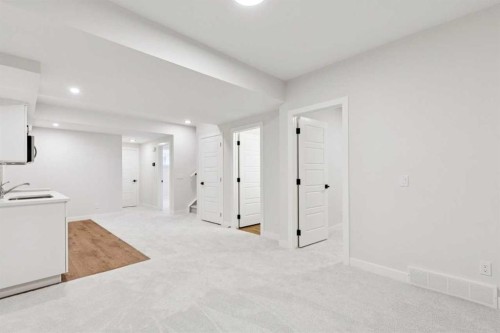 425 Lewiston Landing Ne, Calgary, AB - Indoor Photo Showing Other Room
