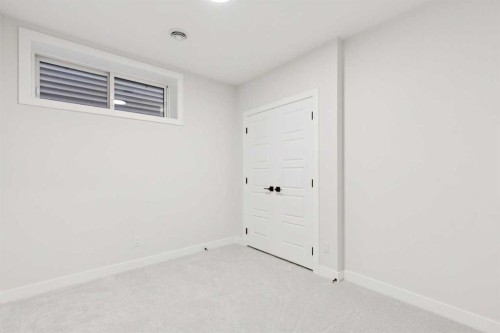 425 Lewiston Landing Ne, Calgary, AB - Indoor Photo Showing Other Room